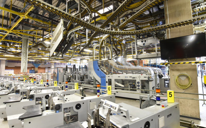 Plastic injection molding factory highlighting size of machines