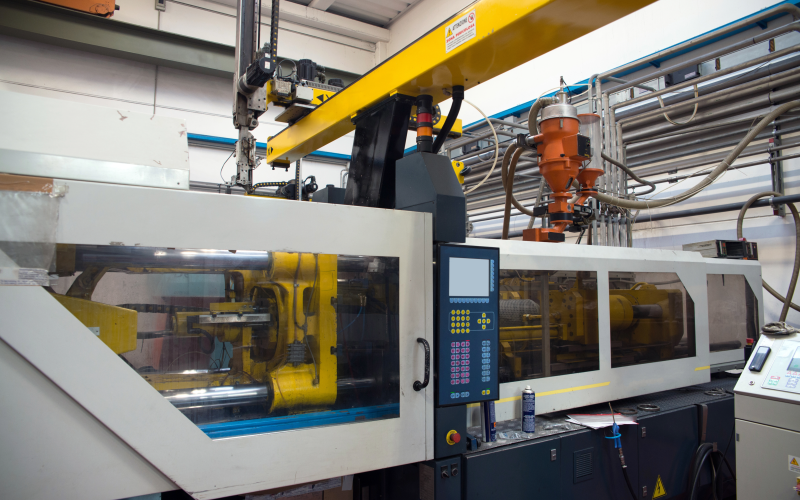 Injection molding machines used for scaling robotics production