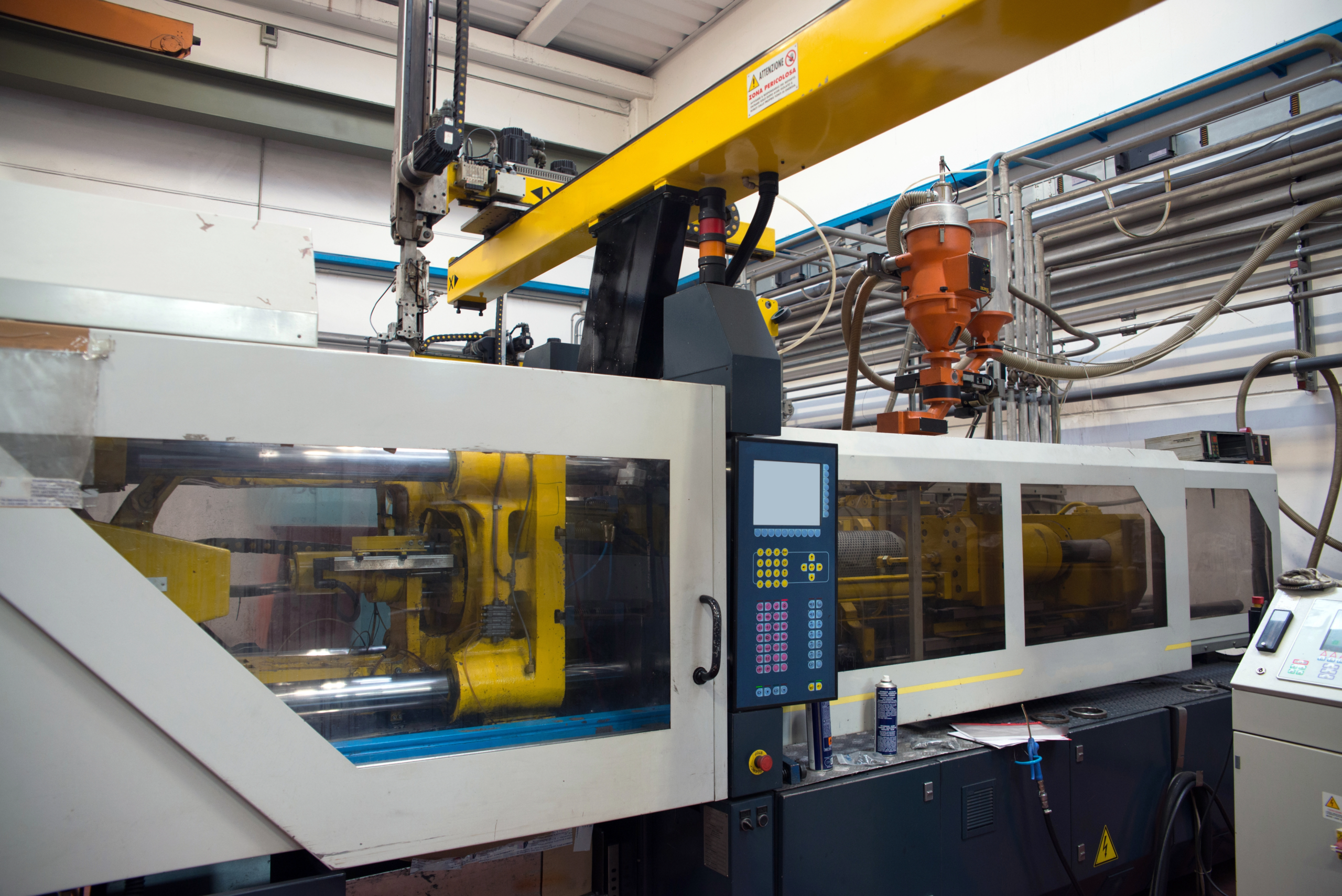 Injection molding machines used for scaling robotics production