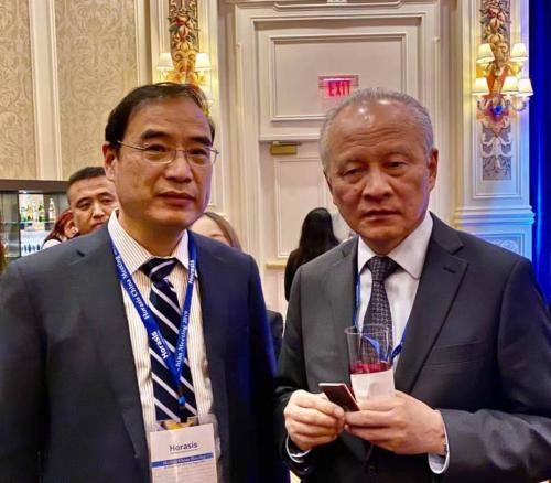 Dr. George Wang discussing US and China trade issues with Chinese ambassador to the US at the Horasis China Forum in Las Vegas.